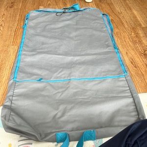 Mb green gray and teal garment bag. New without tags